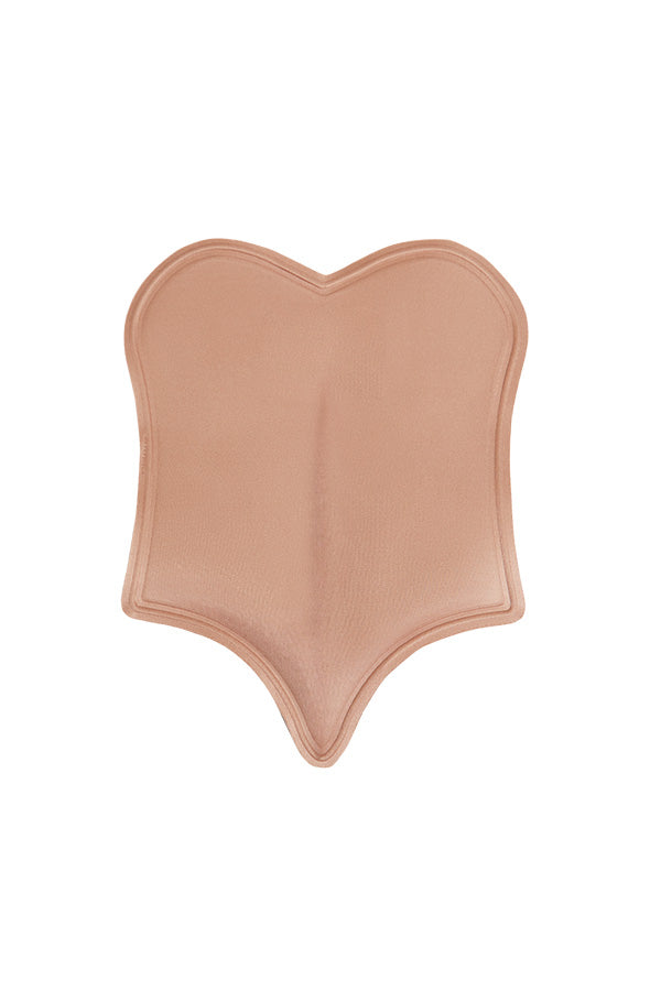 Tabla lumbar JL 0020 detalle del grosor y bordes moldeados que evitan marcas en la piel

